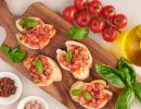 tasty savory tomato italian appetizers bruschetta slices toasted baguette garnished with basil vegetables herbs grilled toasted crusty ciabatta bread